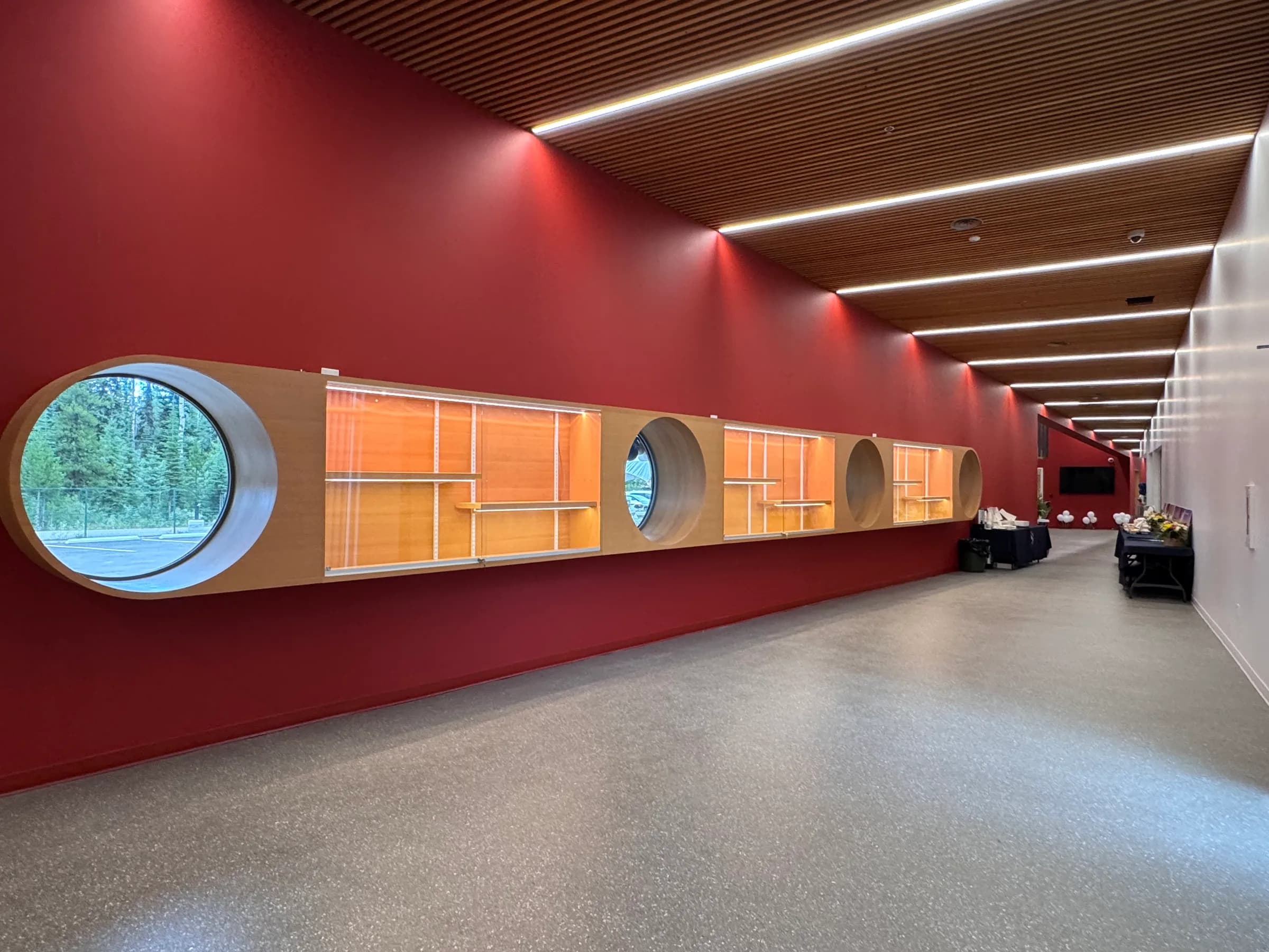 McLeod Lake Community Centre. Sekani Foyer. Looking towards entrance. Wood slats ceiling.